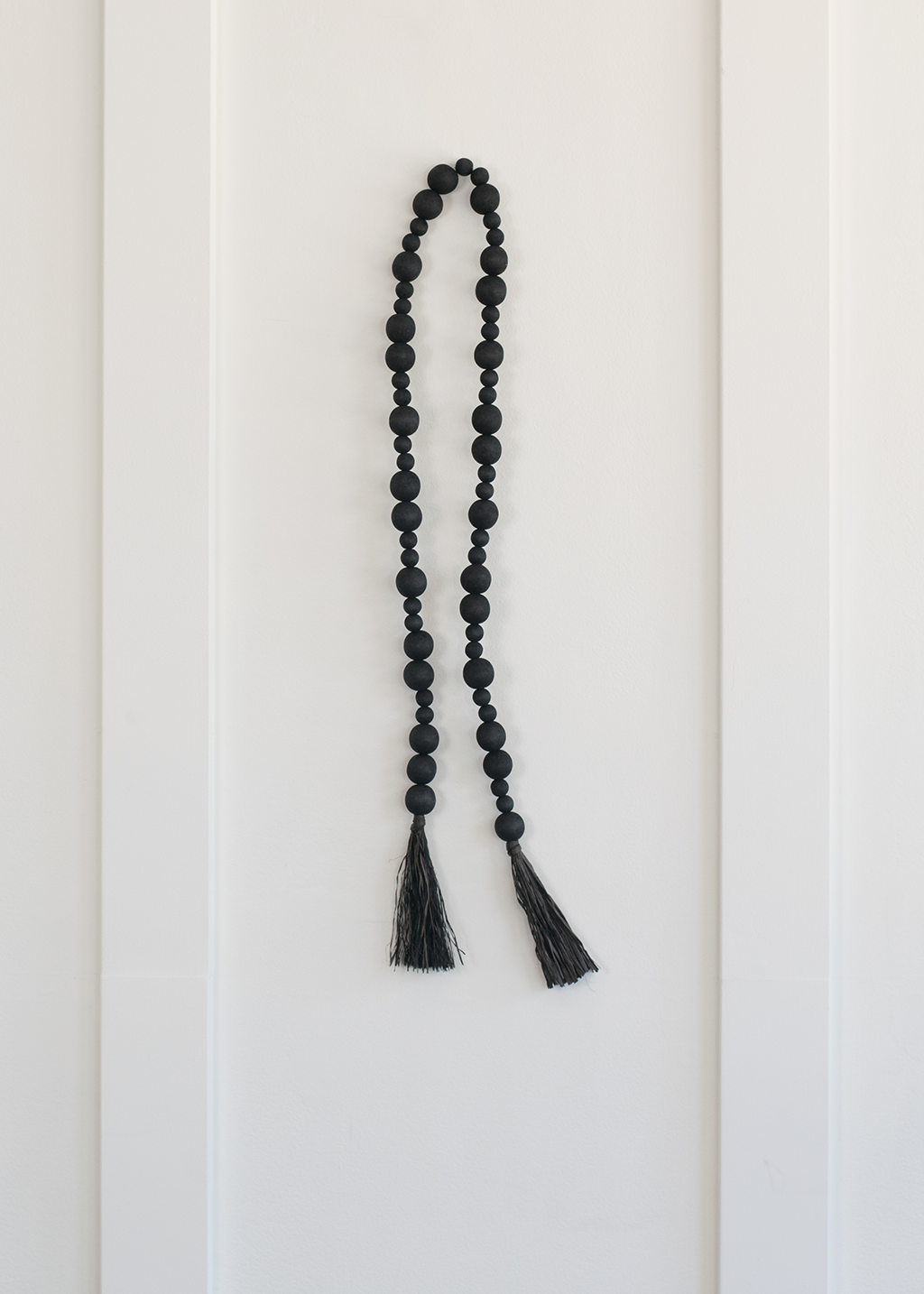 45" Black Acacia Wood Bead & Tassle Garland